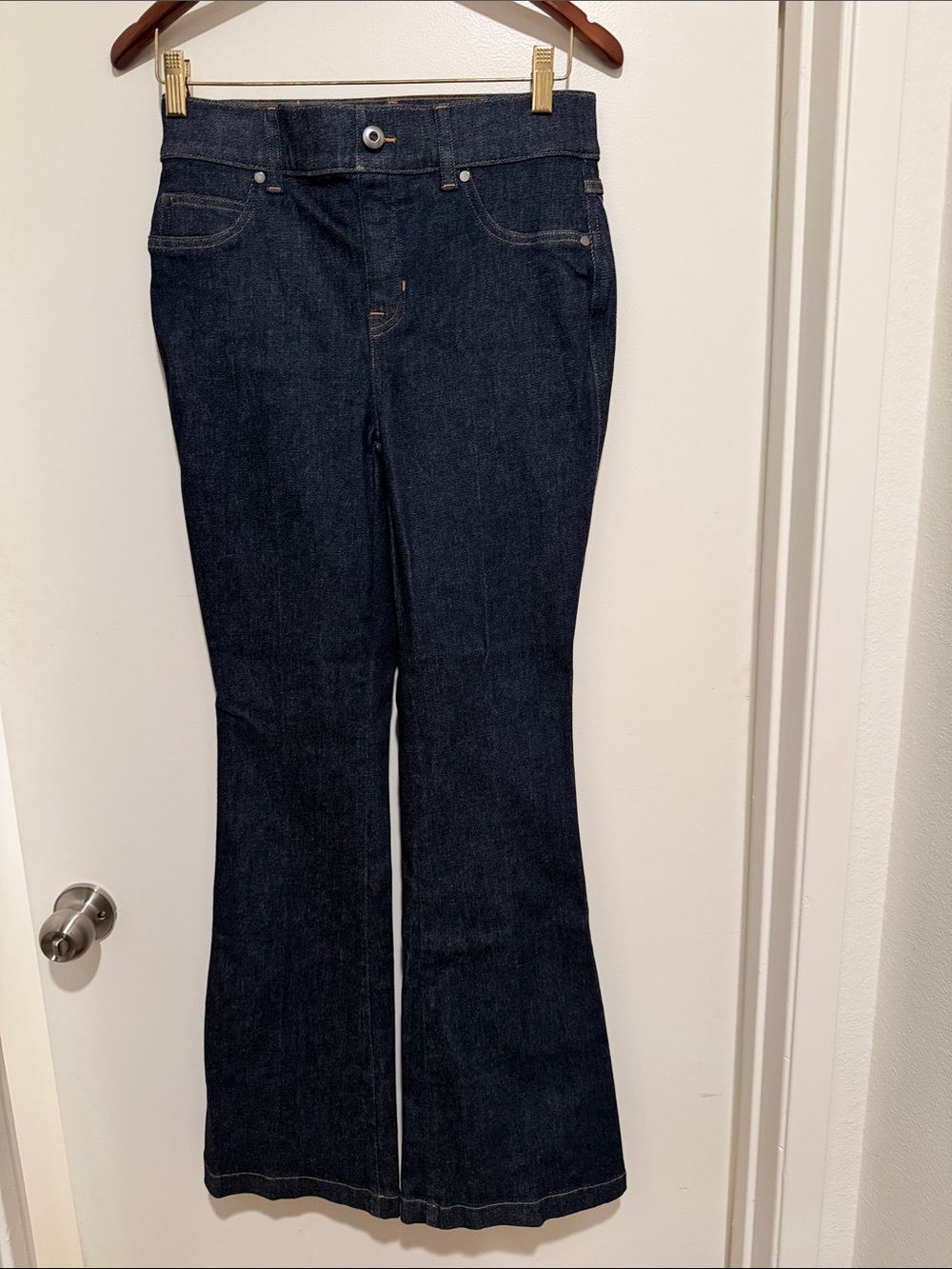 Dark Blue Women's flare bottom spanx jeans. NWT